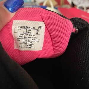 Black and pink high tops